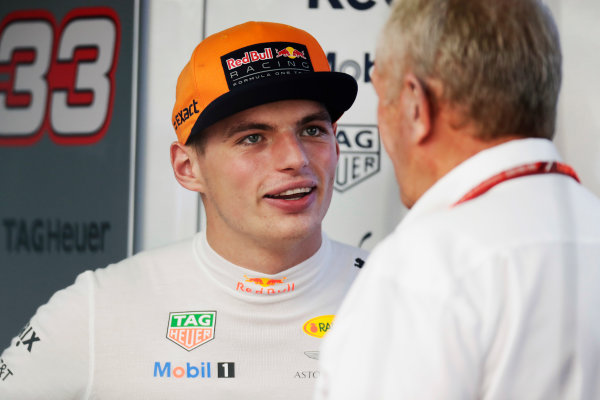 Sepang International Circuit, Sepang, Malaysia.
Saturday 30 September 2017.
Max Verstappen, Red Bull Racing, talks to Helmut Markko, Consultant, Red Bull Racing. 
World Copyright: Zak Mauger/LAT Images 
ref: Digital Image _56I0358