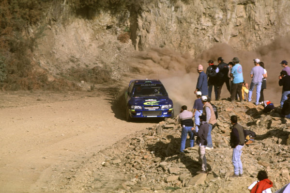 FIA World Rally Championship
Portuguese Rally, Porto, Portugal.
16-19th March 2000.
Richard Burns and Robert Reid (Subaru) action.
World - LAT Photographic
Tel: +44 (0) 181 251 3000
Fax: +44 (0) 181 251 3001
e-mail: latdig@dial.pipex
com

