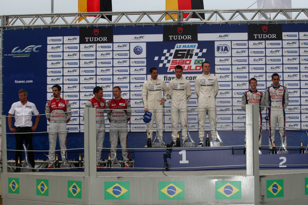 2014 World Endurance Championship,
Interlagos, Brazil. 28th - 30th November 2014.
LMP1 Podium (l-r) Lucas Di Grassi / Loic Duval / Tom Kristensen Audi Sport Team Joest Audi R18 e-tron quattro, Romain Dumas / Neel Jani / Marc Lieb Porsche AG Porsche 919 Hybrid, Anthony Davidson / Sebastien Buemi Toyota Racing Toyota TS 040 Hybrid.
World Copyright: Ebrey / LAT Photographic. 2014 World Endurance Championship,
Interlagos, Brazil. 28th - 30th November 2014.
LMP1 Podium (l-r) Lucas Di Grassi / Loic Duval / Tom Kristensen Audi Sport Team Joest Audi R18 e-tron quattro, Romain Dumas / Neel Jani / Marc Lieb Porsche AG Porsche 919 Hybrid, Anthony Davidson / Sebastien Buemi Toyota Racing Toyota TS 040 Hybrid.
World Copyright: Ebrey / LAT Photographic.