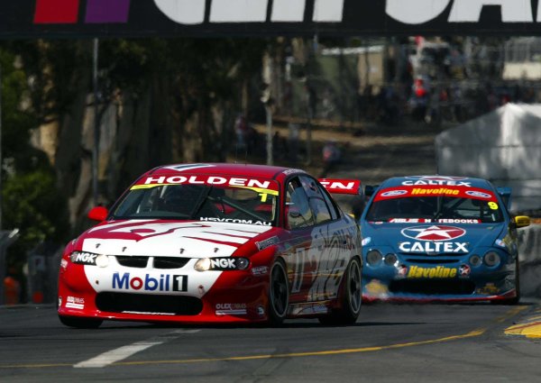 2002 Australian V8 Supercars
Adelaide Clipsal 500. Australia. 17th March 2002.
Holden Racing Team's Mark Skaife and Caltex Havoline driver David Besnard on the streets of Adelaide during the opening laps of the race one.
World Copyright: Mark Horsburgh/LAT Photographic
ref: Digital Image Only