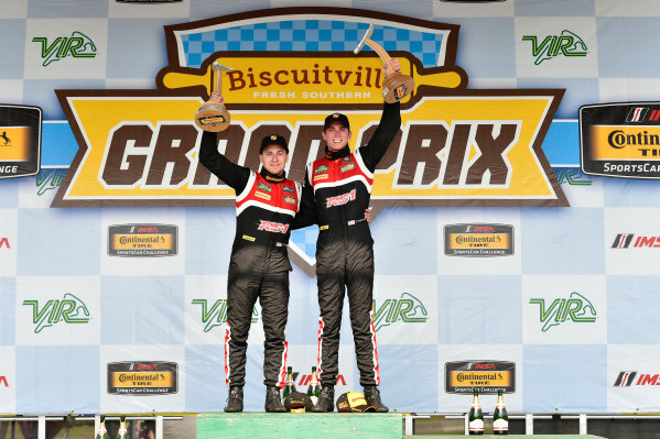 IMSA Continental Tire SportsCar Challenge
Biscuitville Grand Prix
Virginia International Raceway, Alton, VA USA
Saturday 26 August 2017
28, Porsche, Porsche Cayman GT4, GS, Dylan Murcott, Dillon Machavern celebrate the win in victory lane on the podium
World Copyright: Scott R LePage
LAT Images IMSA Continental Tire SportsCar Challenge
Biscuitville Grand Prix
Virginia International Raceway, Alton, VA USA
Saturday 26 August 2017
28, Porsche, Porsche Cayman GT4, GS, Dylan Murcott, Dillon Machavern celebrate the win in victory lane on the podium
World Copyright: Scott R LePage
LAT Images