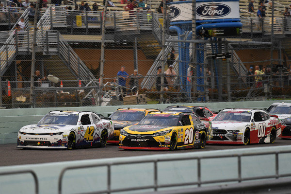 #20: Christopher Bell, Joe Gibbs Racing, Toyota Camry GameStop Transformers, #42: John Hunter Nemechek, Chip Ganassi Racing, Chevrolet Camaro Fire Alarm Services, Inc., and #00: Cole Custer, Stewart-Haas Racing, Ford Mustang Haas Automation #20: Christopher Bell, Joe Gibbs Racing, Toyota Camry GameStop Transformers, #42: John Hunter Nemechek, Chip Ganassi Racing, Chevrolet Camaro Fire Alarm Services, Inc., and #00: Cole Custer, Stewart-Haas Racing, Ford Mustang Haas Automation