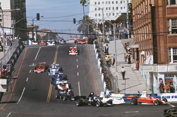 1976 Long Beach Grand Prix 
Long Beach, California, USA. 26-28th March 1976. 
The cars drop down Linden Avenue early in the race. Lauda heads Peterson, Pryce, Jarier, Watson, Scheckter, Laffite, Pace, Mass, Reutemann, Andretti, Fittipaldi and Amon. 
Ref: 76LB17. World Copyright: LAT Photographic 