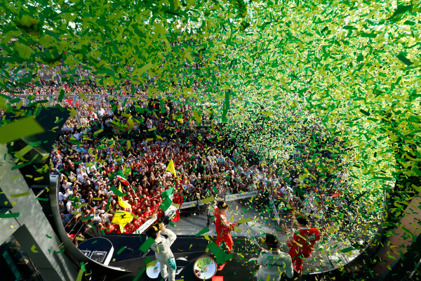 Albert Park, Melbourne, Australia.
Sunday 26 March 2017.
A burst of ticker tape covers the podium. Race winner Sebastian Vettel, Ferrari, celebrates with Luigi Fraboni, Head of Power Unit Race Operation, Ferrari. The pair are joined by Lewis Hamilton, Mercedes AMG, and Valtteri Bottas, Mercedes AMG.
World Copyright: Steven Tee/LAT Images
Ref: Digital Image _O3I3254