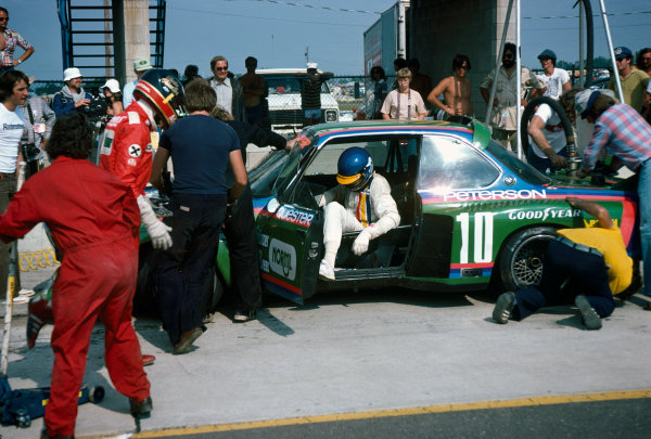 Watkins Glen, New York State, USA. 10th July 1976. Rd 6.
Ronnie Peterson/Dieter Quester (BMW 3
5 CSL), 5th position, driver change and pit stop, action. 
World Copyright: LAT Photographic.
Ref:  76SCARS