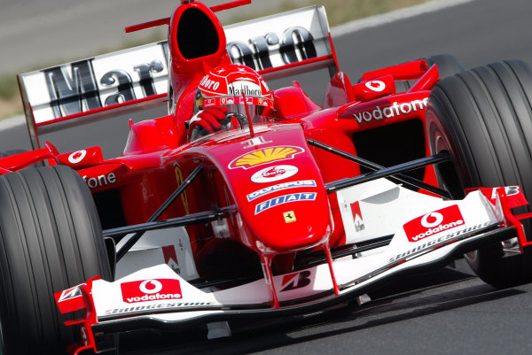 2004 Hungarian Grand Prix - Saturday Qualifying,
Budapest, Hungary. 14th August 2004 
Michael Schumacher, Ferrari F2004, action.
World Copyright: Steve Etherington/LAT Photographic 
ref: Digital Image Only

