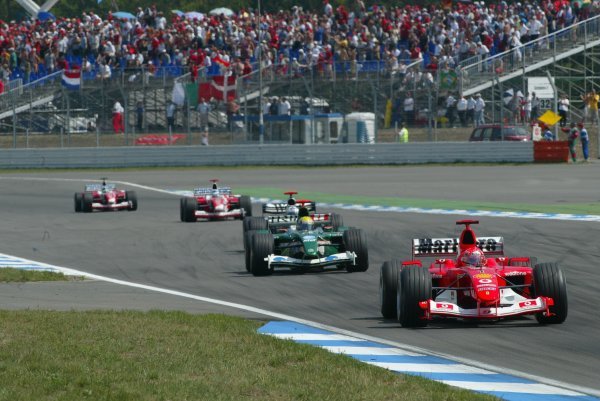 Michael Schumacher (GER) Ferrari F2003-GA suffered a puncture late in the race that dropped him from second to seventh position, and opened up the World Championship again.
Formula One World Championship, Rd12, German Grand Prix, Race Day, Hockenheim, Germany, 3 August 2003.
DIGITAL IMAGE Michael Schumacher (GER) Ferrari F2003-GA suffered a puncture late in the race that dropped him from second to seventh position, and opened up the World Championship again.
Formula One World Championship, Rd12, German Grand Prix, Race Day, Hockenheim, Germany, 3 August 2003.
DIGITAL IMAGE