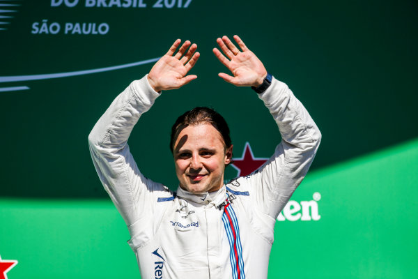 Interlagos, Sao Paulo, Brazil.
Sunday 12 November 2017.
Felipe Massa, Williams Martini Racing, waves from the podium whilst celebrating after his final home Grand Prix.
World Copyright: Charles Coates/LAT Images 
ref: Digital Image AN7T7569