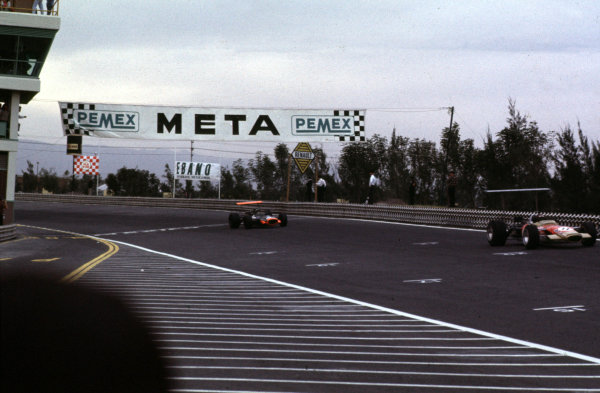 1968 Mexican Grand Prix.
Mexico City, Mexico.
1-3 November 1968.
Jackie Oliver (Lotus 49B Ford) leads Pedro Rodriguez (BRM P133). They finished in 3rd and 4th positions respectively.
Ref-68 MEX 13.
World Copyright - LAT Photographic
1968 Mexican Grand Prix.
Mexico City, Mexico.
1-3 November 1968.
Jackie Oliver (Lotus 49B Ford) leads Pedro Rodriguez (BRM P133). They finished in 3rd and 4th positions respectively.
Ref-68 MEX 13.
World Copyright - LAT Photographic