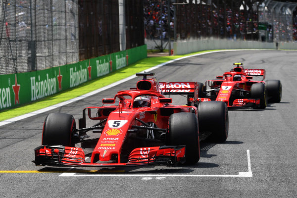 Sebastian Vettel, Ferrari SF71H and Kimi Raikkonen, Ferrari SF71H on the grid