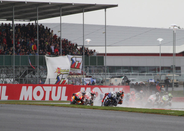 British Grand Prix.
Silverstone, England. 10th-12th June 2011.
Jorge Lorenzo, Yamaha, leads Casey Stoner, Andrea Dovizioso and Marco Simoncelli, Honda, at the start. Action.
World Copyright: Kevin Wood/LAT Photographic.
ref: Digital Image British Grand Prix.
Silverstone, England. 10th-12th June 2011.
Jorge Lorenzo, Yamaha, leads Casey Stoner, Andrea Dovizioso and Marco Simoncelli, Honda, at the start. Action.
World Copyright: Kevin Wood/LAT Photographic.
ref: Digital Image