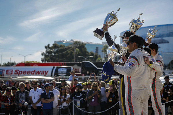 #5 Mustang Sampling Racing Cadillac DPi, DPi: Joao Barbosa, Filipe Albuquerque, #6 Acura Team Penske Acura DPi, DPi: Juan Pablo Montoya, Dane Cameron, #7 Acura Team Penske Acura DPi, DPi: Helio Castroneves, Ricky Taylor celebrate on the podium