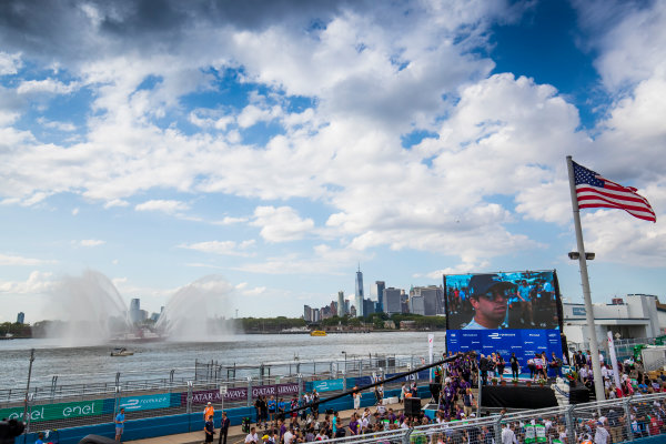 2016/2017 FIA Formula E Championship.
Round 9 - New York City ePrix, Brooklyn, New York, USA.
Saturday 15 July 2017.
Sam Bird (GBR), DS Virgin Racing, Spark-Citroen, Virgin DSV-02,Jean-Eric Vergne (FRA), Techeetah, Spark-Renault, Renault Z.E 16, and Stephane Sarrazin (FRA), Techeetah, Spark-Renault, Renault Z.E 16, celerate on the podium.
Photo: Sam Bloxham/LAT/Formula E
ref: Digital Image _W6I2881