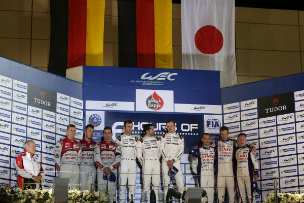 2015 FIA World Endurance Championship,
Bahrain International Circuit, Bahrain.
19th - 21st November 2015.
P1 Podium (l-r) Marcel Fassler / Andre Lotterer / Benoit Treluyer Audi Sport Team Joest Audi R18 e-tron quattro, Romain Dumas / Neel Jani / Marc Lieb Porsche Team Porsche 919 Hybrid, Alexander Wurz / Stephane Sarrazin / Mike Conway Toyota Racing Toyota TS040 Hybrid .
World Copyright: Jakob Ebrey / LAT Photographic. 2015 FIA World Endurance Championship,
Bahrain International Circuit, Bahrain.
19th - 21st November 2015.
P1 Podium (l-r) Marcel Fassler / Andre Lotterer / Benoit Treluyer Audi Sport Team Joest Audi R18 e-tron quattro, Romain Dumas / Neel Jani / Marc Lieb Porsche Team Porsche 919 Hybrid, Alexander Wurz / Stephane Sarrazin / Mike Conway Toyota Racing Toyota TS040 Hybrid .
World Copyright: Jakob Ebrey / LAT Photographic.