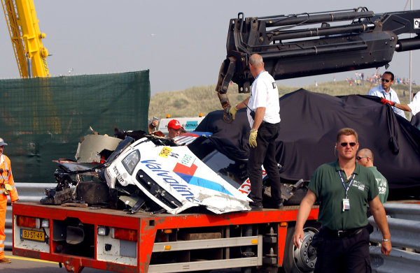 2004 DTM Championship
Zandvoort, Netherlands. 4th - 5th September.
The remains of Peter Dumbreck's OPC Phoenix Opel Vectra GTS are loaded onto a transporter after his huge accident.
World Copyright: Andre Irlmeier/LAT Photographic
ref: Digital Image Only