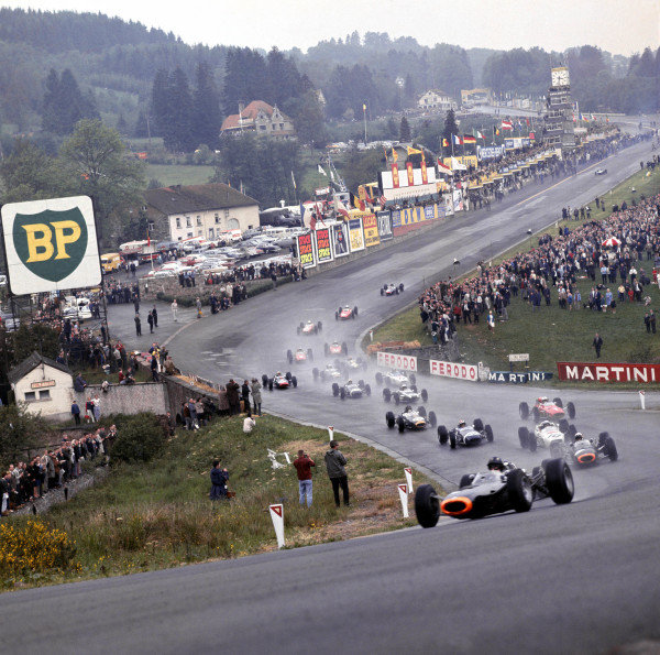 1965 Belgian Grand Prix.
Spa-Francorchamps, Belgium.
11-13 June 1965.
Graham Hill leads Jackie Stewart (Both BRM P261's), Richie Ginther (Honda RA272), Jo Siffert (Brabham BT11 BRM), John Surtees (Ferrari 158), Dan Gurney (Brabham BT11 Climax) and the rest of the field through Eau Rouge at the start.
Ref-1702.
A Race Through Time exhibition number 44.
World Copyright - LAT Photographic
1965 Belgian Grand Prix.
Spa-Francorchamps, Belgium.
11-13 June 1965.
Graham Hill leads Jackie Stewart (Both BRM P261's), Richie Ginther (Honda RA272), Jo Siffert (Brabham BT11 BRM), John Surtees (Ferrari 158), Dan Gurney (Brabham BT11 Climax) and the rest of the field through Eau Rouge at the start.
Ref-1702.
A Race Through Time exhibition number 44.
World Copyright - LAT Photographic