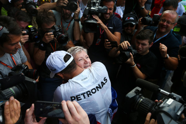 Autodromo Hermanos Rodriguez, Mexico City, Mexico.
Sunday 29 October 2017.
Lewis Hamilton, Mercedes AMG, celebrates with his mum Carmen Larbalestier, surrounded by photographers and media,after securing his 4th world drivers championship title, and third with Mercedes.
World Copyright: Charles Coates/LAT Images
ref: Digital Image DJ5R7922 Autodromo Hermanos Rodriguez, Mexico City, Mexico.
Sunday 29 October 2017.
Lewis Hamilton, Mercedes AMG, celebrates with his mum Carmen Larbalestier, surrounded by photographers and media,after securing his 4th world drivers championship title, and third with Mercedes.
World Copyright: Charles Coates/LAT Images
ref: Digital Image DJ5R7922