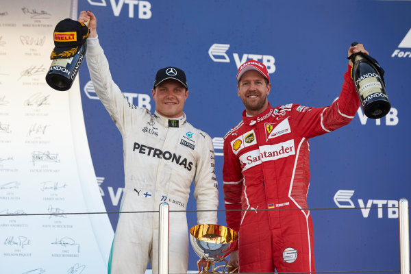 Sochi Autodrom, Sochi, Russia.
Sunday 30 April 2017.
Valtteri Bottas, Mercedes AMG, 1st Position, and Sebastian Vettel, Ferrari, 2nd Position, on the podium.
World Copyright: Steve Etherington/LAT Images
ref: Digital Image SNE18792 Sochi Autodrom, Sochi, Russia.
Sunday 30 April 2017.
Valtteri Bottas, Mercedes AMG, 1st Position, and Sebastian Vettel, Ferrari, 2nd Position, on the podium.
World Copyright: Steve Etherington/LAT Images
ref: Digital Image SNE18792