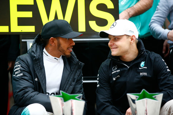 Shanghai International Circuit, Shanghai, China.  Sunday 09 April 2017. 
Lewis Hamilton, Mercedes AMG, 1st Position, Valtteri Bottas, Mercedes AMG, and the Mercedes team celebrate after the race.
World Copyright: Andrew Hone/LAT Images 
ref: Digital Image _ONY6092