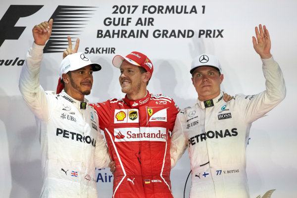 Bahrain International Circuit, Sakhir, Bahrain.
Sunday 16 April 2017.
Lewis Hamilton, Mercedes AMG, 2nd Position, Sebastian Vettel, Ferrari, 1st Position, and Valtteri Bottas, Mercedes AMG, 3rd Position, on the podium.
World Copyright: Steve Etherington/LAT Images
ref: Digital Image SNE23075 Bahrain International Circuit, Sakhir, Bahrain.
Sunday 16 April 2017.
Lewis Hamilton, Mercedes AMG, 2nd Position, Sebastian Vettel, Ferrari, 1st Position, and Valtteri Bottas, Mercedes AMG, 3rd Position, on the podium.
World Copyright: Steve Etherington/LAT Images
ref: Digital Image SNE23075