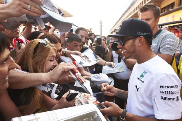 Circuit de Catalunya, Barcelona, Spain.
Thursday 8 May 2014.
Lewis Hamilton, Mercedes AMG, signs autographs for fans.
World Copyright: Steve EtheringtonLAT Photographic.
ref: Digital Image SNE11762 copy