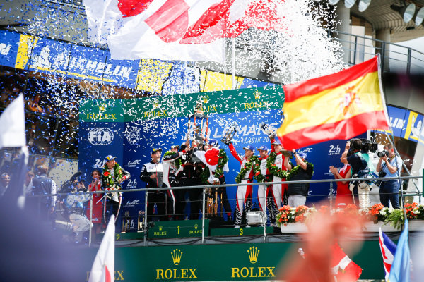 #3 Rebellion Racing Rebellion R-13: Mathias Beche, Gustavo Menezes, Thomas Laurent, finishes 3rd,  #7 Toyota Gazoo Racing Toyota TS050: Mike Conway, Kamui Kobayashi, Jose Maria Lopez, finishes and Fernando Alonso, Toyota Gazoo Racing, and Sébastien Buemi, Toyota Gazoo Racing, celebrate win Le Mans 2018