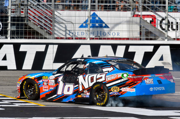 2017 NASCAR XFINITY Series - Rinnai 250
Atlanta Motor Speedway, Hampton, GA USA
Saturday 4 March 2017
Kyle Busch, NOS Energy Drink Toyota Camry celebrates his win with a burnout
World Copyright: Nigel Kinrade/LAT Images
ref: Digital Image 17ATL1nk05564 2017 NASCAR XFINITY Series - Rinnai 250
Atlanta Motor Speedway, Hampton, GA USA
Saturday 4 March 2017
Kyle Busch, NOS Energy Drink Toyota Camry celebrates his win with a burnout
World Copyright: Nigel Kinrade/LAT Images
ref: Digital Image 17ATL1nk05564