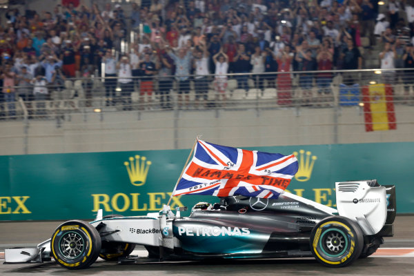 Yas Marina Circuit, Abu Dhabi, United Arab Emirates.
Sunday 23 November 2014.
Lewis Hamilton, Mercedes F1 W05 Hybrid, celebrates after winning the race and the 2014 Drivers Championship.
World Copyright: Alastair Staley/LAT Photographic.
ref: Digital Image _79P0850 Yas Marina Circuit, Abu Dhabi, United Arab Emirates.
Sunday 23 November 2014.
Lewis Hamilton, Mercedes F1 W05 Hybrid, celebrates after winning the race and the 2014 Drivers Championship.
World Copyright: Alastair Staley/LAT Photographic.
ref: Digital Image _79P0850