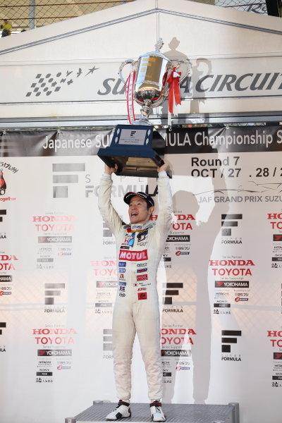 Race winner and 2018 drivers' champion Naoki Yamamoto, Team Mugen Dallara SF14 Honda, celebrates on the podium.