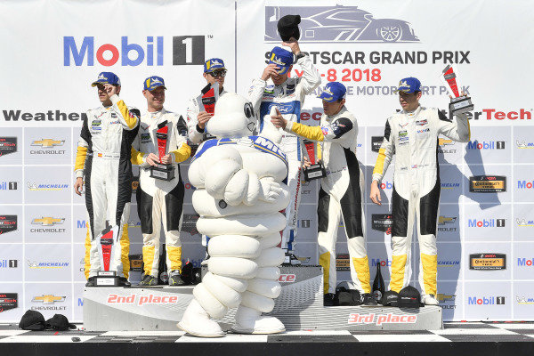 #67 Chip Ganassi Racing Ford GT, GTLM: Ryan Briscoe, Richard Westbrook celebrates the win on the podium with
#3 Corvette Racing Chevrolet Corvette C7.R, GTLM: Antonio Garcia, Jan Magnussen, #4 Corvette Racing Chevrolet Corvette C7.R, GTLM: Oliver Gavin, Tommy Milner, Bib, Bibendum