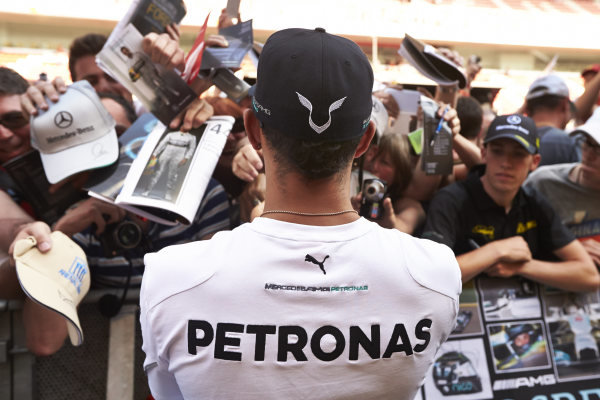 Circuit de Catalunya, Barcelona, Spain.
Thursday 8 May 2014.
Lewis Hamilton, Mercedes AMG, signs autographs for fans.
World Copyright: Steve EtheringtonLAT Photographic.
ref: Digital Image SNE11831 copy