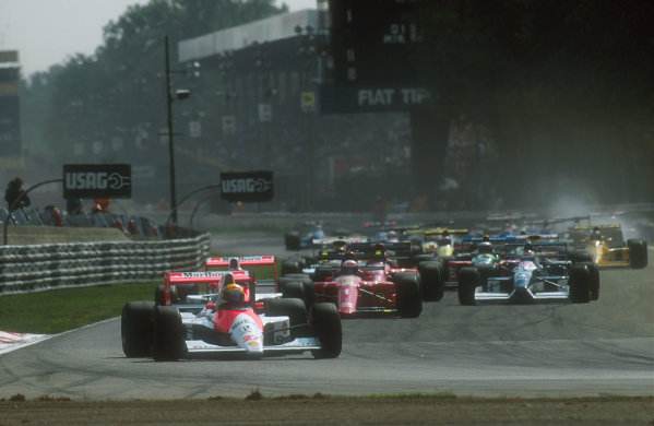 1990 Italian Grand Prix.
Monza, Italy.
7-9 September 1990.
Ayrton Senna leads teammate Gerhard Berger (both McLaren MP4/5B Honda's), Alain Prost (Ferrari 641), Jean Alesi (Tyrrell 019 Ford) and Nigel Mansell (Ferrari 641) at the start.
Ref-90 ITA 01.
World Copyright - LAT Photographic

