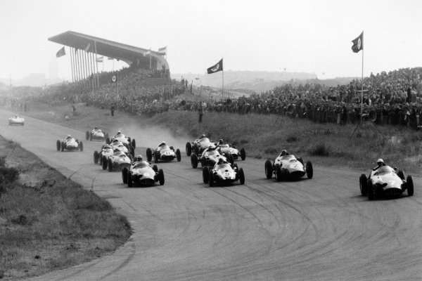 1959 Dutch Grand Prix
Zandvoort, Holland. 31 May 1959
Jo Bonnier, BRM P25, 1st position, leads Harry Schell, BRM P25, retired, Masten Gregory, Cooper T51-Climax, 3rd position, Tony Brooks, Ferrari Dino 246, retired, Jack Brabham, Cooper T51-Climax, 2nd position, Jean Behra, Ferrari Dino 246, 5th position, Graham Hill, Lotus 16-Climax, 7th position, and Stirling Moss, Cooper T51-Climax, retired, at the start. Cliff Allison, Ferrari Dino 246, 9th position, Phil Hill, Ferrari Dino 246, 6th position, Innes Ireland, Lotus 16-Climax, 4th position, Roy Salvadori, Aston Martin DBR4/250, retired, Carroll Shelby, Aston Martin DBR4/250, retired, and Maurice Trintignant, Cooper T51-Climax, 8th position, are among those following, with Carel Godin de Beaufort, Porsche RSK, 10th position, having only just left the line, action
World Copyright: LAT PhotographicRef: Autosport b&w print. Published: Autosport, 5/6/1959 p725