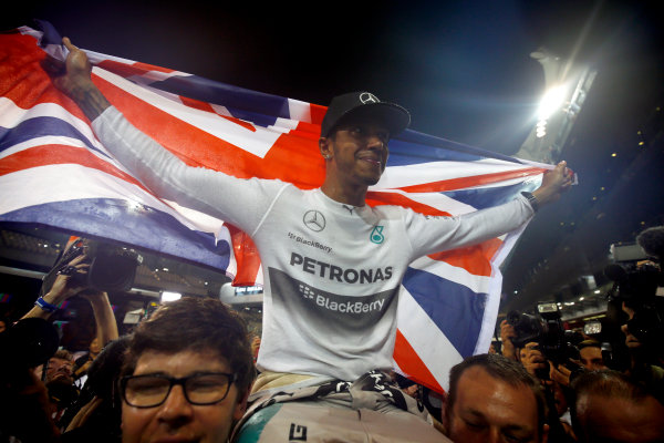 Yas Marina Circuit, Abu Dhabi, United Arab Emirates.
Sunday 23 November 2014.
Lewis Hamilton, Mercedes AMG, 1st Position, celebrates 2014 title success with his team.
World Copyright: Andy Hone/LAT Photographic.
ref: Digital Image _ONY2514 Yas Marina Circuit, Abu Dhabi, United Arab Emirates.
Sunday 23 November 2014.
Lewis Hamilton, Mercedes AMG, 1st Position, celebrates 2014 title success with his team.
World Copyright: Andy Hone/LAT Photographic.
ref: Digital Image _ONY2514