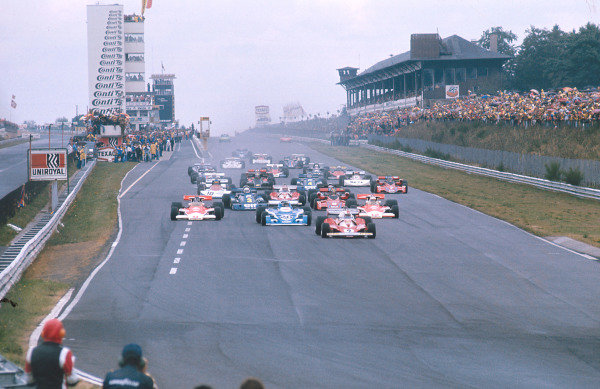 1976 German Grand Prix.
Nurburgring, Germany.
30/7-1/8 1976.
Clay Regazzoni (Ferrari 312T2) leads Jacques Laffite (Ligier JS5 Matra), James Hunt and Jochen Mass (both McLaren M23 Ford's) at the start.
Ref-76 GER 03.
World Copyright - LAT Photographic

