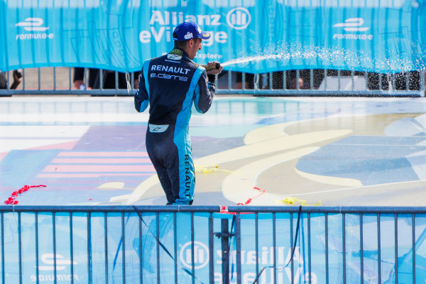 2016/2017 FIA Formula E Championship.
Round 8 - Berlin ePrix, Tempelhof Airport, Berlin, Germany.
Sunday 11 June 2017.
Sebastien Buemi (SUI), Renault e.Dams, Spark-Renault, Renault Z.E 16, sprays the champagne on the podium.
Photo: Zak Mauger/LAT/Formula E
ref: Digital Image _56I5869