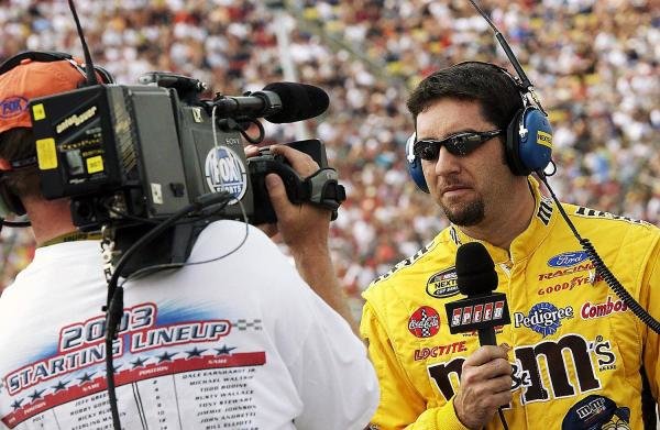 Fifth placed Elliott Sadler (USA) Robert Yates Racing M&M's Ford is interviewed prior to qualifying.
NASCAR Nextel Cup Series, Rd 15, DHL 400, Michigan International Speedway, Brooklyn, Michigan, USA, 20 June 2004.
DIGITAL IMAGE Fifth placed Elliott Sadler (USA) Robert Yates Racing M&M's Ford is interviewed prior to qualifying.
NASCAR Nextel Cup Series, Rd 15, DHL 400, Michigan International Speedway, Brooklyn, Michigan, USA, 20 June 2004.
DIGITAL IMAGE