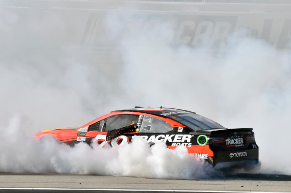 2017 Monster Energy NASCAR Cup Series - Kobalt 400
Las Vegas Motor Speedway - Las Vegas, NV USA
Sunday 12 March 2017
Martin Truex Jr, Bass Pro Shops/TRACKER BOATS Toyota Camry celebrates his win with a burnout
World Copyright: Nigel Kinrade/LAT Images
ref: Digital Image 17LAS1nk07779 2017 Monster Energy NASCAR Cup Series - Kobalt 400
Las Vegas Motor Speedway - Las Vegas, NV USA
Sunday 12 March 2017
Martin Truex Jr, Bass Pro Shops/TRACKER BOATS Toyota Camry celebrates his win with a burnout
World Copyright: Nigel Kinrade/LAT Images
ref: Digital Image 17LAS1nk07779