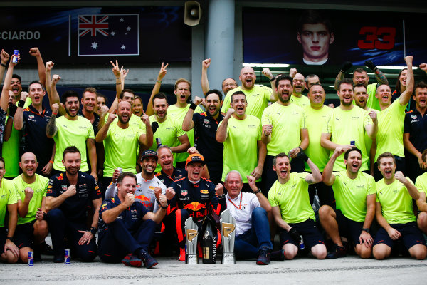 Sepang International Circuit, Sepang, Malaysia.
Sunday 1 October 2017.
Max Verstappen, Red Bull, 1st Position, Daniel Ricciardo, Red Bull Racing, 3rd Position, Christian Horner, Team Principal, Red Bull Racing, Helmut Markko, Consultant, Red Bull Racing, and the Red Bull team celebrate.
World Copyright: Andrew Hone/LAT Images 
ref: Digital Image _ONZ0500