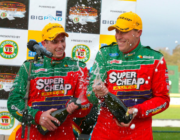 2003 Australian V8 Supercars, Round 9, Sandown, 14th September 2003.
FORD Falcon BA drivers Steve Ellery and Louke Youlden on the podium after finishing second in the Betta Electrical 500 held at Melbournes Sandown International Raceway today. Ellery and Youlden finished second.
Photo: Mark Horsburgh/LAT Photographic