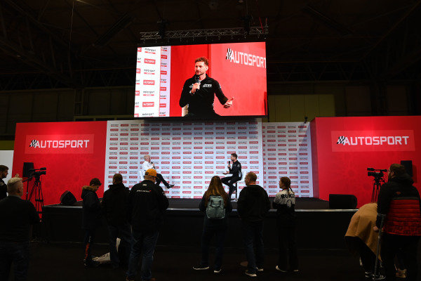 Shane Kelly, racing driver, is interviewed on the Autosport main stage