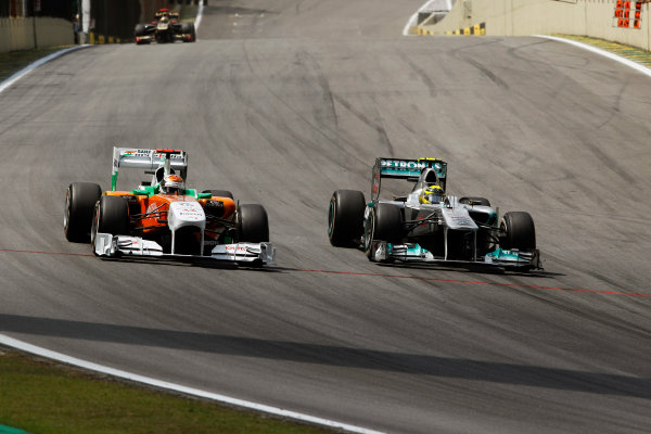 Interlagos, Sao Paulo, Brazil.
27th November 2011.
Adrian Sutil, Sahara Force India VJM04 Mercedes battles with Nico Rosberg, Mercedes GP W02. Action.
World Copyright:Andrew Ferraro/LAT Photographic
ref: Digital Image _Q0C6309